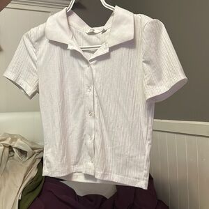 Nice little t-shirt/shirt,
put 2-3 times
in perfect condition